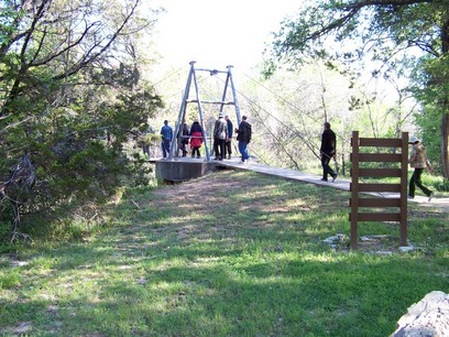 Walking bridge across river.