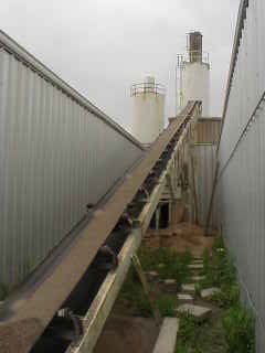 Conveyor belt for sand mixture.