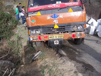 Truck Stuck in road.