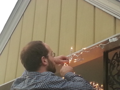 David Installing Christmas Lights.