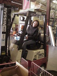 Tess on forklift.
