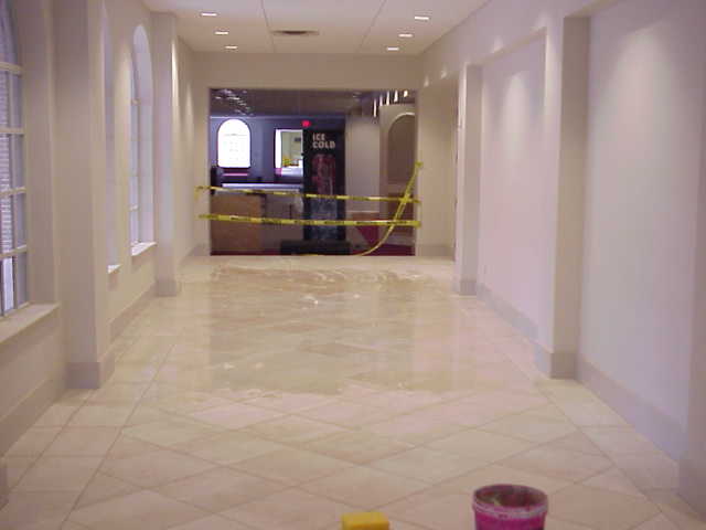 Entry hall with ceramic tiles.