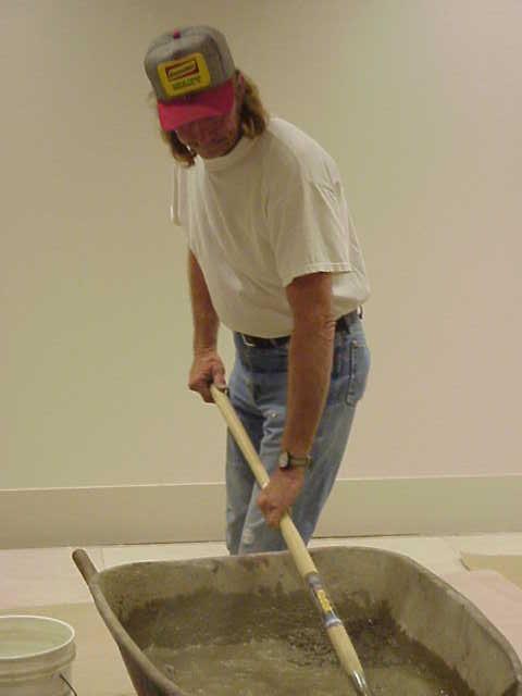 Joey mixing cement.